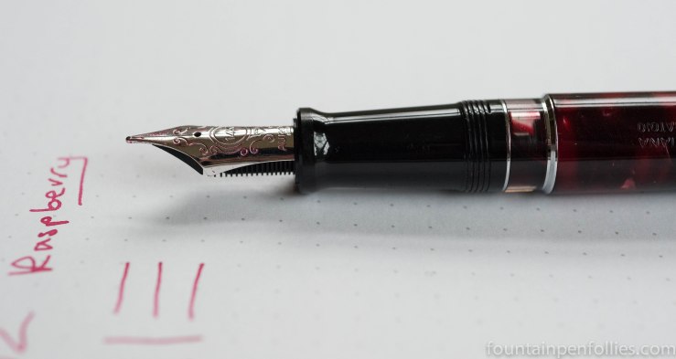Aurora Optima Burgundy fountain pen nib with KWZ Raspberry ink